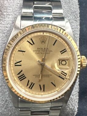 Rolex Two-Tone Gold and Silver Roman Dial Datejust Gold bezel champagne dial
